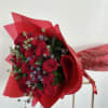 This bouquet is a vibrant celebration of bold red roses. Whether it&#039;s