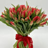 Behold the timeless elegance of our Red Tulip Bouquet, a captivating ensemble