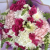 Imagine a bouquet straight out of a fairy tale, bursting with vibrant