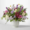 A true work of art, this grand bouquet of purple, lavender and