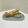 Palo Santo with a ceramic holder.