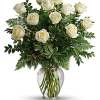 Elevate the art of romance and elegance with our exquisite arrangement of