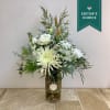 This bouquet is an elegant arrangement with a soft, organic feel. It