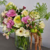 A beautiful bouquet with lovely spring flowers. Depending on the variety of