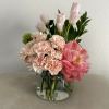 This exquisite bouquet is the ultimate gift for anyone special, featuring a