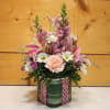 Celebrate the arrival of a precious baby girl with this charming arrangement