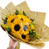 This bouquet beams with rustic charm and joyful spontaneity. Its brilliant yellow