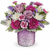 beautiful roses with a touch , of statice lavender , carnations, leather