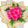 This soft yet striking bouquet offers a sweet fusion of romance and