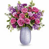  crafted from hand-blown art glass with an iridescent finish, radiating elegance