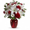  Red roses, snow white lilies and playful daisies are gathered in