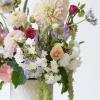 Indulge in the lavish elegance of the &quot;Dahlia Dreams&quot; arrangement. Crafted with