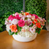 This sizable arrangement features our best collection of vibrant pink and orange