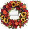 Our Tuscan wreath is a vibrant mix of yellow, red and orange