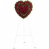 Remember a loved one&#039;s generous heart with this red arrangement in a