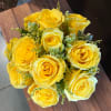 12 premium yellow roses in a low and lush style! Perfect for