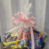 This is a Candy Gift Basket, wrapped in clear cellophane and tied