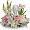 Show them you care with this gorgeous display of roses, lilies and