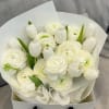 A Simple Bouquet that features beautiful Ranunculus and Tulips.