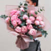 20 beautiful peonies with greenery in a beautiful paper wrap with ribbon.