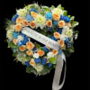 A heart shaped floral wreath featuring peach roses, blue and white carnations