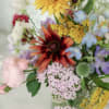 A lovely vased arrangement of local flowers cut from our very own