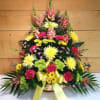 Bright Fireside Basket by Savilles Country Florist is a touching tribute that