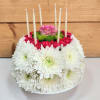The Wonderful Wishes Flower Cake is a stunning floral arrangement crafted to
