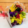 The Wrapped Brights Bouquet by Savilles Country Florist.  Wrapped bouquet of
