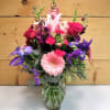 Stunning Beauty is an exquisite floral arrangement that radiates elegance and charm.