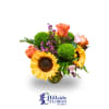 Bright and colorful arrangement of roses, hydrangea and other mixed flowers