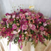 This elegant casket design  consists of your lovely pinks, lavenders, and