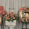 This beautiful set includes a casket arrangement, a cross, and a wreath.