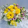 Beautiful bouquet featuring  hydrangeas, yellow daises, yellow roses, pink alstroemeria, and
