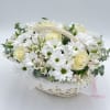A small basket full of tenderness &mdash; white roses and daisy-like chrysanthemums