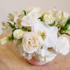 Sugar Rose is a timeless white flower arrangement in a petite pink