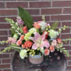 Arriving in a beautiful, peachy keepsake ceramic, in tones of peach, pink