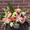 Arriving in a beautiful, peachy keepsake ceramic, in tones of peach, pink