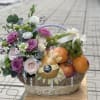 Flowers and assorted fruits of the season! In a beautiful small basket