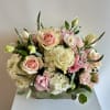 A bright mixture of blooms in a wood box is always a