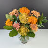 Bask in the warm glow of our Amber Radiance Bouquet. This vibrant