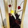 Romantic Lantern Keepsake
A charming gold lantern filled with preserved roses, delicate accents