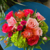 Inspired by the summer sunset color, orange protea and roses peach and
