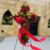The Standing Cross is a timeless and deeply reverent funeral arrangement, designed