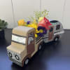 &quot;Living Life&quot; Floral Truck

Description:

This fun floral arrangement features vibrant fresh blooms in