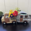 &quot;Living Life&quot; Floral Truck

Description:

This fun floral arrangement features vibrant fresh blooms in