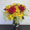 This radiant bouquet features cheerful yellow alstroemeria blooms beautifully complemented by deep
