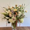 Delve into the world of luxury with our meticulously crafted flower arrangement