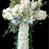 Funeral cross standing.
Many cultures and religions use symbols during funeral services to