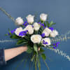 White roses meet striking blue florals and soft eucalyptus in this minimalist